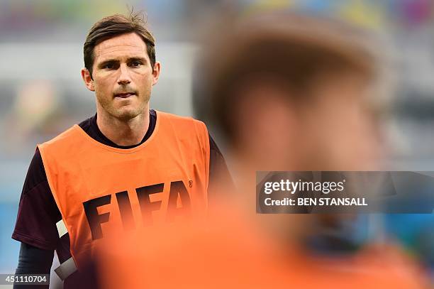England's midfielder Frank Lampard takes part in a training session at the Mineirao Stadium in Belo Horizonte on June 23 on the eve of the 2014 FIFA...
