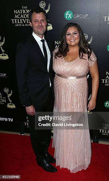 Radio producer Angelica McDaniel and husband Brian McDaniel attend the 41st Annual Daytime Emmy Awards at The Beverly Hilton Hotel on June 22, 2014...