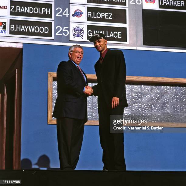 Tony Parker poses with David Stern after being drafted by the San Antonio Spurs on June 27, 2001 at the The Theater at Madison Square Garden in New...