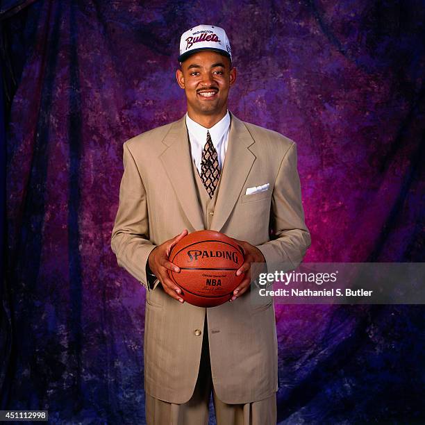 Juwan Howard poses for a portrait after being drafted by the Washington Bullets on June 29, 1994 at the Hosier Dome in Indianapolis, Indiana. NOTE TO...