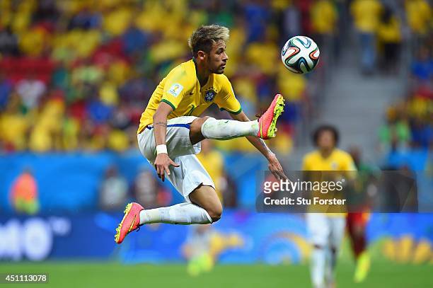 Neymar of Brazil controls the ball during the 2014 FIFA World Cup Brazil Group A match between Cameroon and Brazil at Estadio Nacional on June 23,...