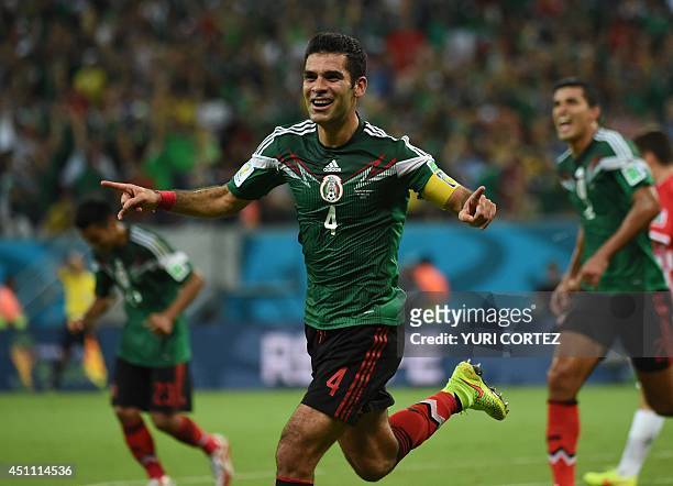 Mexico's defender Rafael Marquez celebrates after scoring during a Group A football match between Croatia and Mexico at the Pernambuco Arena in...