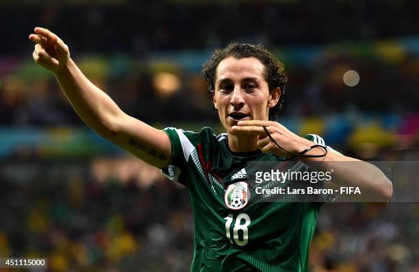 Andres Guardado of Mexico celebrates scoring his team's second goal during the 2014 FIFA World Cup Brazil Group A match between Croatia and Mexico at...