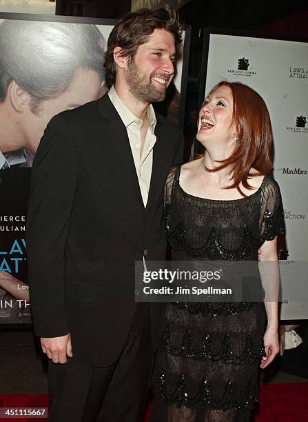 Julianne Moore and husband Bart Freundlich during Laws of Attraction New York Premiere - Outside Arrivals at Loews Astor Plaza in New York City, New...