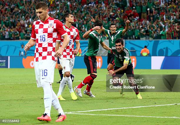 Rafael Marquez of Mexico celebrates scoring his team's first goal during the 2014 FIFA World Cup Brazil Group A match between Croatia and Mexico at...