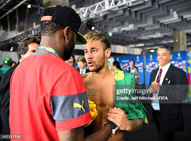 Neymar of Brazil speaks to Alexandre Song of Cameroon in the tunnel after the 2014 FIFA World Cup Brazil Group A match between Cameroon and Brazil at...