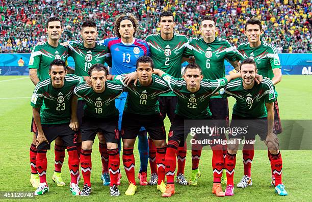Mexico players pose for a team photo prior to the 2014 FIFA World Cup Brazil Group A match between Croatia and Mexico at Arena Pernambuco on June 23,...