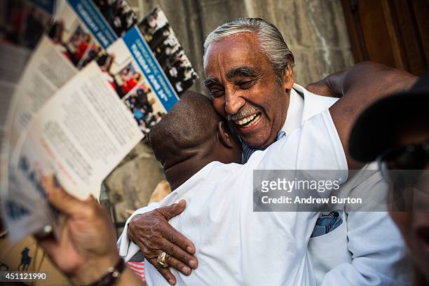 Rep. Charlie Rangel meets with constituents while campaigning in New York's 13th District on June 23, 2014 in the Harlem neighborhood of New York...