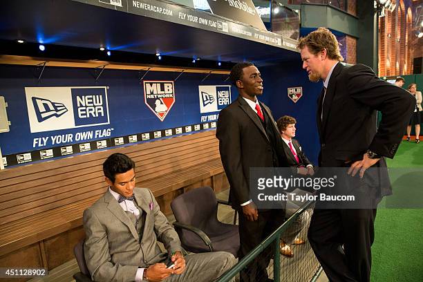 St. Louis Cardinal Representative Ryan Franklin speaks with draft attendee Nick Gordon during the 2014 First-Year Player Draft, Thursday, June 5 at...