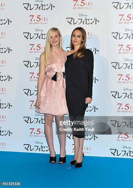 Elle Fanning and Angelina Jolie attend "Maleficent" press conference for the Japan premiere at Grand Hyatt Tokyo on June 24, 2014 in Tokyo, Japan.