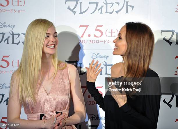 Elle Fanning and Angelina Jolie attend "Maleficent" press conference for the Japan premiere at Grand Hyatt Tokyo on June 24, 2014 in Tokyo, Japan.