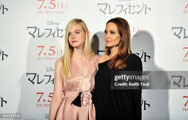 Elle Fanning and Angelina Jolie attend "Maleficent" press conference for the Japan premiere at Grand Hyatt Tokyo on June 24, 2014 in Tokyo, Japan.