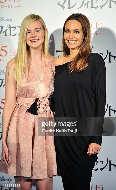 Elle Fanning and Angelina Jolie attend "Maleficent" press conference for the Japan premiere at Grand Hyatt Tokyo on June 24, 2014 in Tokyo, Japan.