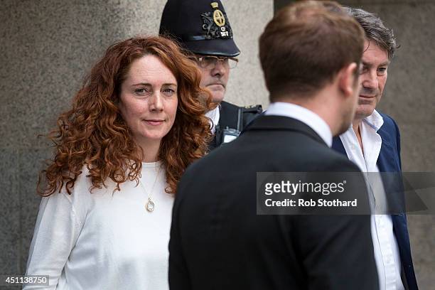 Former News International chief executive Rebekah Brooks and her husband Charlie Brooks leave the Old Bailey on June 24, 2014 in London, England....