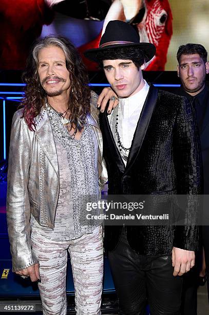 Steven Tyler and Leon Else attend the Roberto Cavalli show during the Milan Menswear Fashion Week Spring Summer 2015 on June 24, 2014 in Milan, Italy.