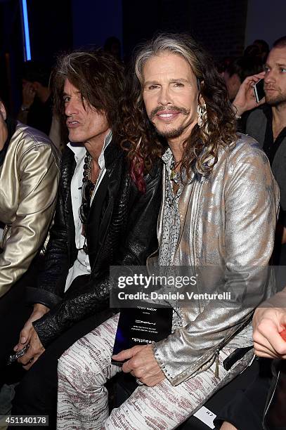 Joe Perry and Steven Tyler attend the Roberto Cavalli show during the Milan Menswear Fashion Week Spring Summer 2015 on June 24, 2014 in Milan, Italy.
