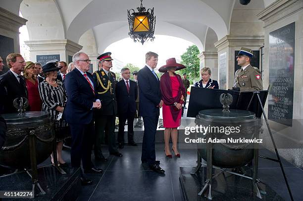 King Willem-Alexander of The Netherlands and Queen Maxima of The Netherlands visit the Tomb of the Unknown Soldier during their trip to Poland on...