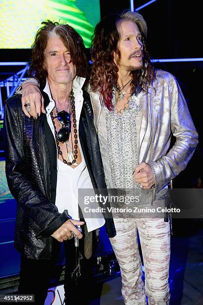 Joe Perry and Steven Tyler attend the Roberto Cavalli show during the Milan Menswear Fashion Week Spring Summer 2015 on June 24, 2014 in Milan, Italy.