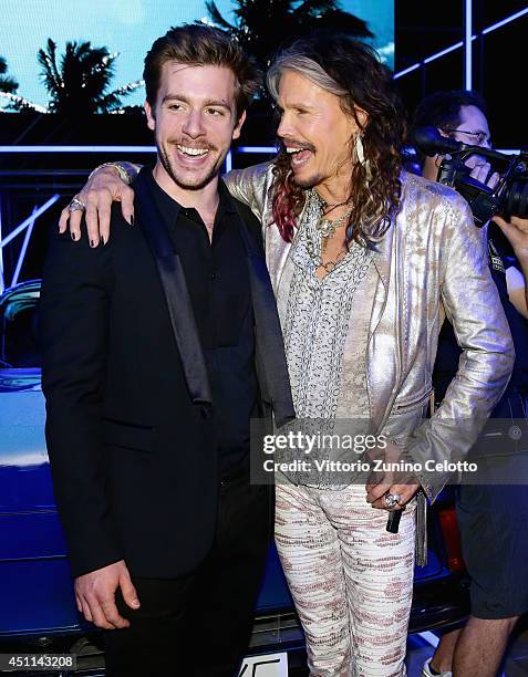 Edoardo Purgatori and Steven Tyler attend the Roberto Cavalli show during the Milan Menswear Fashion Week Spring Summer 2015 on June 24, 2014 in...