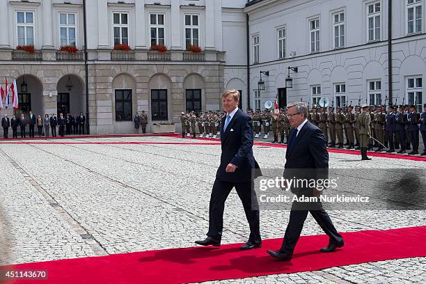 King Willem-Alexander is greeted by Bronislaw Komorowski President of Poland at the Presidential Palace during a trip to Poland on June 24, 2014 in...