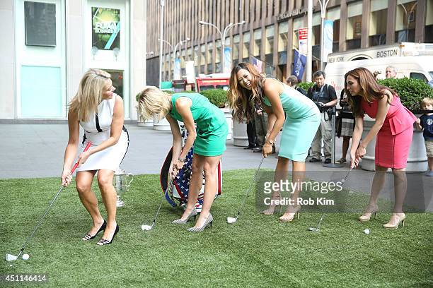 Michelle Wie , 2014 U.S. Women's Open Golf Champion, with hosts Heather Nauert, Elisabeth Hasselbeck and Maria Molina, play golf at "FOX And Friends"...