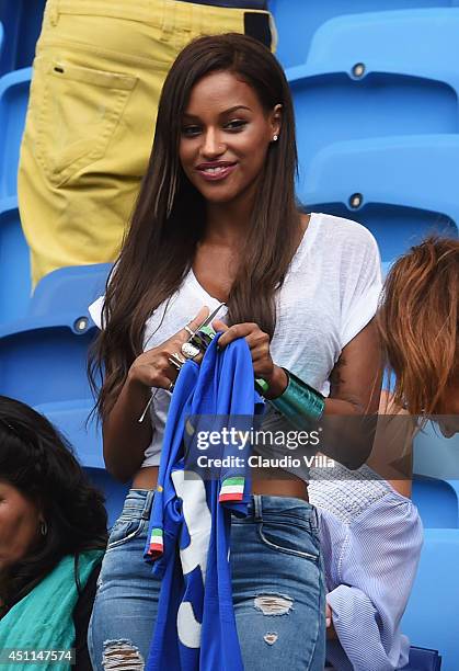Mario Balotelli's girlfriend Fanny Neguesha smiles ahead of the 2014 FIFA World Cup Brazil Group D match between Italy and Uruguay at Estadio das...