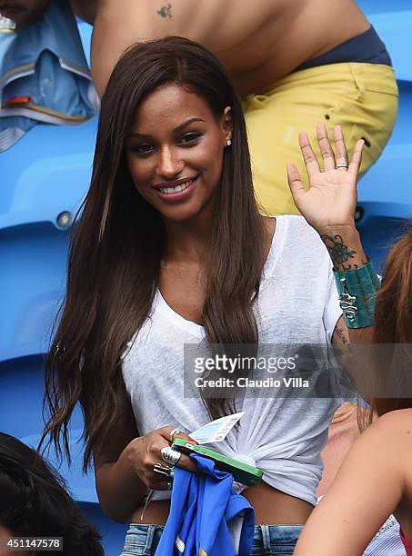 Mario Balotelli's girlfriend Fanny Neguesha waves ahead of the 2014 FIFA World Cup Brazil Group D match between Italy and Uruguay at Estadio das...