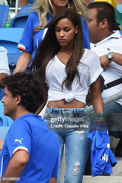 Mario Balotelli's girlfriend Fanny Neguesha walks to her seat prior to the 2014 FIFA World Cup Brazil Group D match between Italy and Uruguay at...