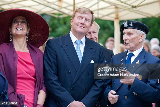 Queen Maxima of The Netherlands and King Willem-Alexander of the Netherlands visit the monument of Polish World War II veteran General Stanislav...