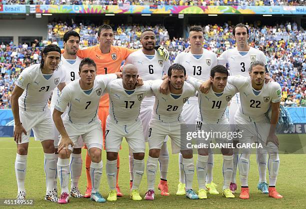 Members of the Uruguay's national team Uruguay's forward Luis Suarez, Uruguay's goalkeeper Fernando Muslera, Uruguay's midfielder Alvaro Pereira,...