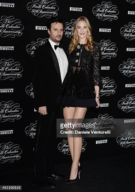Eva Riccobono and Matteo Ceccarini attend the Pirelli Calendar 50th Anniversary Red Carpet on November 21, 2013 in Milan, Italy.