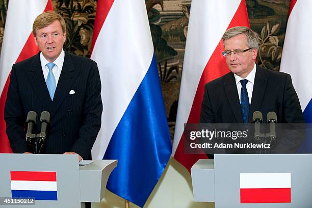 King Willem-Alexander of the Netherlands and Bronislaw Komorowski President of Poland speak during a press conference at Belvedere Palace as part of...