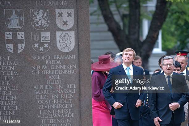 King Willem-Alexander of the Netherands and Bronislaw Komorowski President of Poland visit the monument of Polish World War II veteran General...