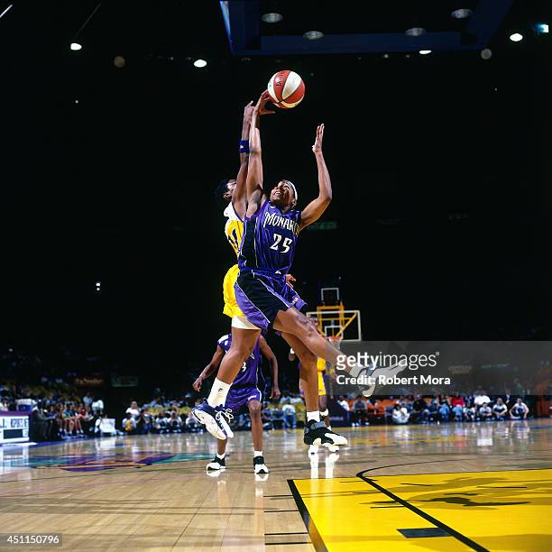 Kendra Holland-Corn of the Sacramento Monarchs grabs a rebound against the Los Angeles Sparks at Staples Center on July 9, 1999 in Los Angeles,...