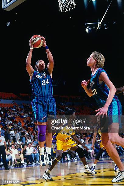 Natalie Williams of the Utah Starzz grabs a rebound against the Los Angeles Sparks at Staples Center on June 28, 1999 in Los Angeles, California....