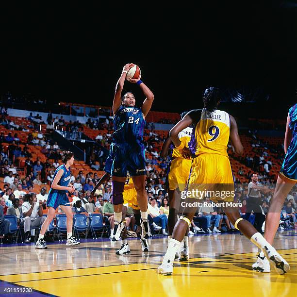 Natalie Williams of the Utah Starzz shoots against the Los Angeles Sparks at Staples Center on June 28, 1999 in Los Angeles, California. NOTE TO...