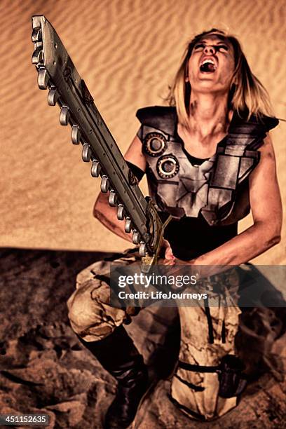 fierce amazon warrior queen sounding the call of victory - ancient female warriors stock pictures, royalty-free photos & images