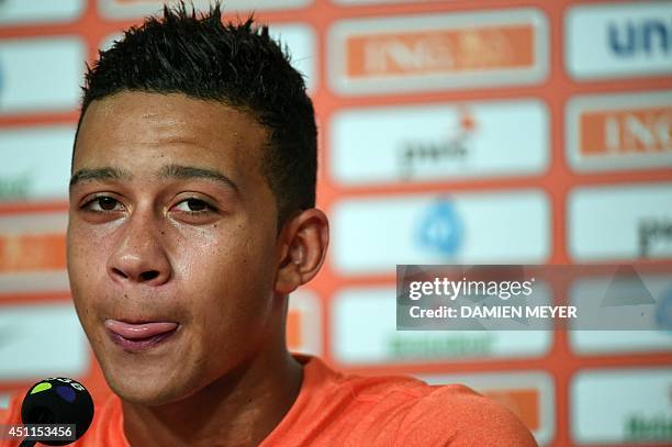 Netherlands' forward Memphis Depay attends a press conference after a training session at the Flamengo Stadium in Rio de Janeiro on June 24, 2014...