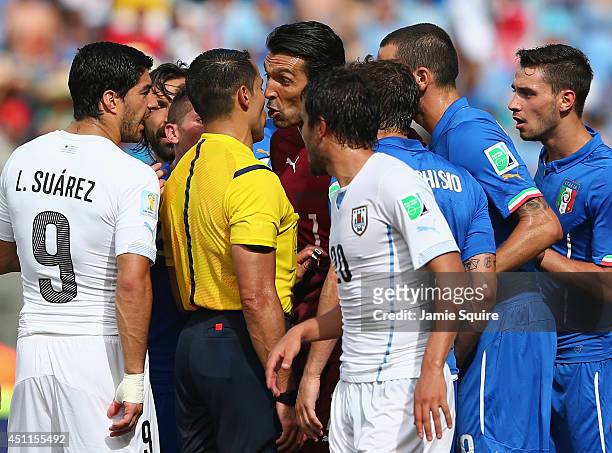 Gianluigi Buffon of Italy appeals to referee Marco Rodriguez after Claudio Marchisio is sent off during the 2014 FIFA World Cup Brazil Group D match...