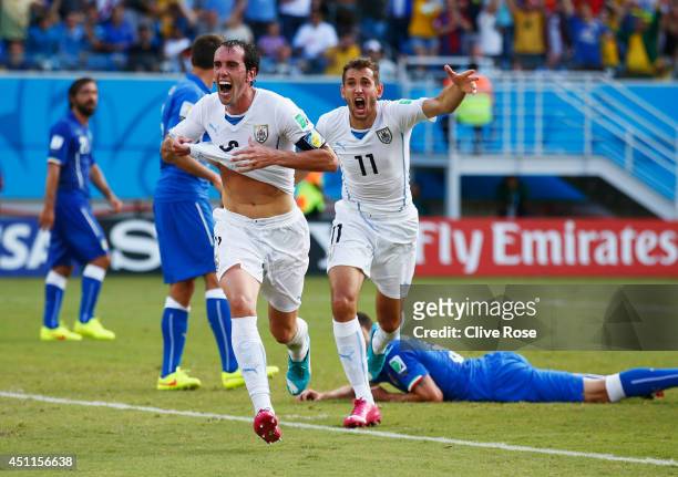 Diego Godin of Uruguay celebrates scoring his team's first goal during the 2014 FIFA World Cup Brazil Group D match between Italy and Uruguay at...