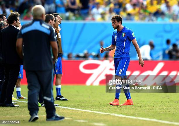 Claudio Marchisio of Italy walks off the pitch after being sent off with a straight red card during the 2014 FIFA World Cup Brazil Group D match...
