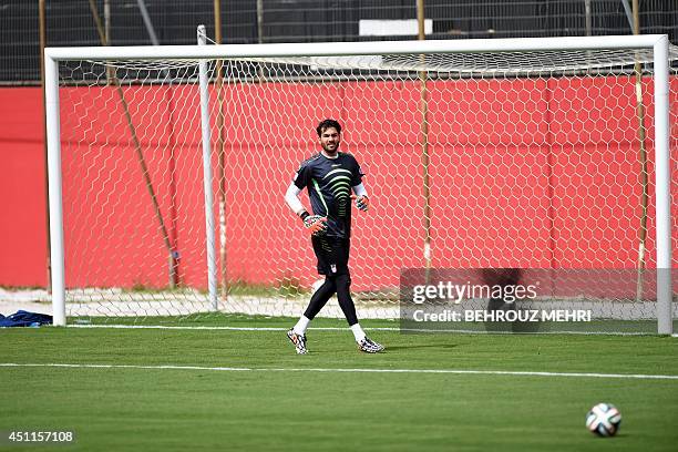 Iran's goalkeeper Alireza Haghighi takes part in a training session at Manoel Barradas stadium in Salvador on June 24 on the eve of their 2014 FIFA...