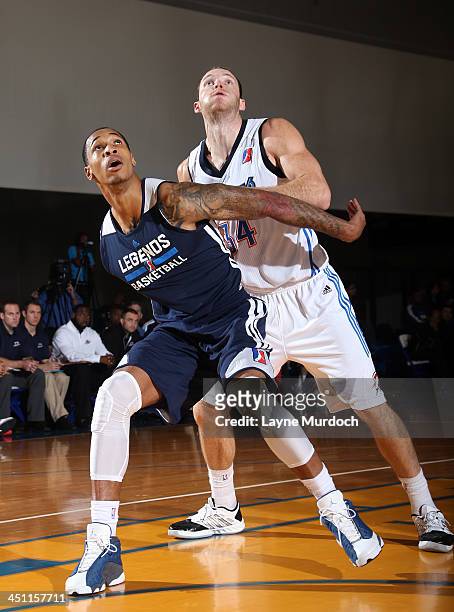 Chad Gillaspy of the Tulsa 66ers fights for a rebound against Garlon Green of the Texas Legends during an NBA D-League preseason game on November 14,...