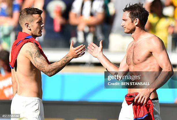 England's midfielder Frank Lampard and England's midfielder Jack Wilshere shake hands after the Group D football match between Costa Rica and England...