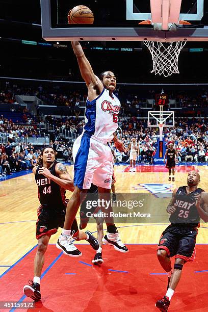 Cory Maggette of the Los Angeles Clippers goes up for a dunk against the Miami Heat at the Staples Center on December 13, 2000. NOTE TO USER: User...