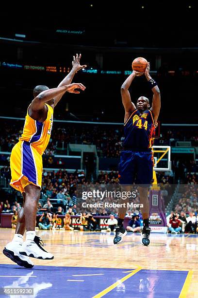 Marc Jackson of the Golden State Warriors takes a shot against the Los Angeles Lakers at the Staples Center on March 4, 2001. NOTE TO USER: User...