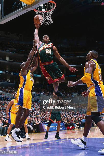 Desmond Mason of the Seattle SuperSonics goes up for a dunk against the Los Angeles Lakers at the Staples Center on March 11, 2001. NOTE TO USER:...