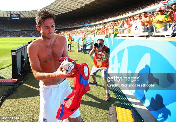Frank Lampard of England throws a boot into the crowd after a 0-0 draw during the 2014 FIFA World Cup Brazil Group D match between Costa Rica and...