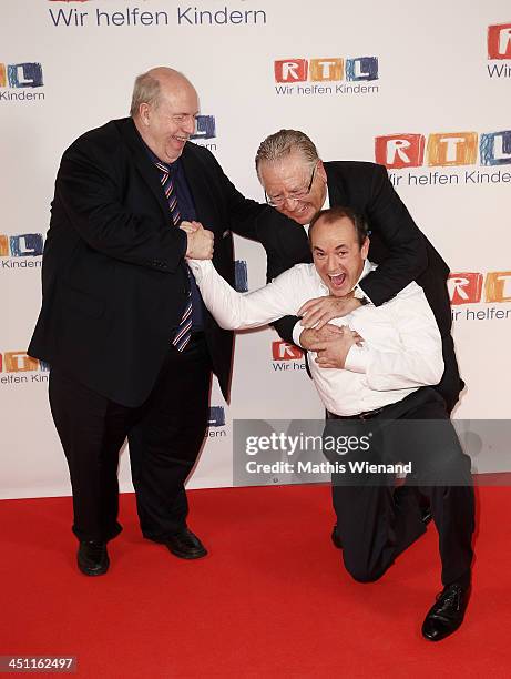 Reiner Calmund,Wolfram Kons and Heinz Horrmann attend the RTL Telethon 2013 on November 21, 2013 in Cologne, Germany.