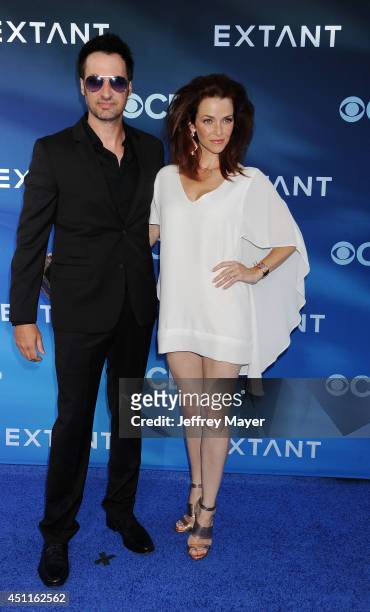 Actress Annie Wersching and guest attend the Premiere Of CBS Films' 'Extant' at California Science Center on June 16, 2014 in Los Angeles, California.